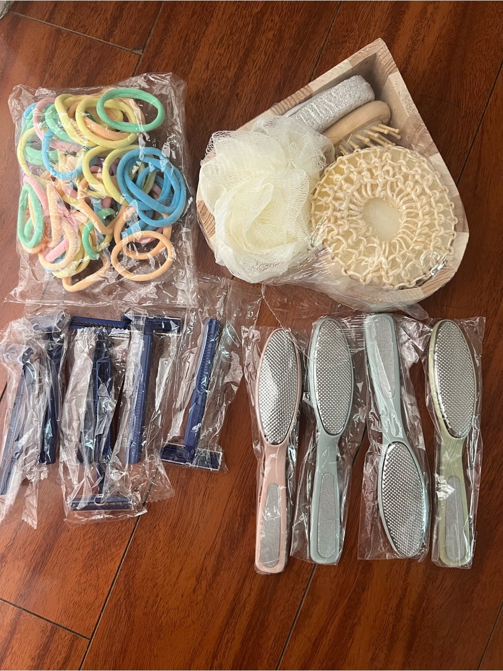 home grooming tools includes multiple plastic-handled foot rasps for callus remo